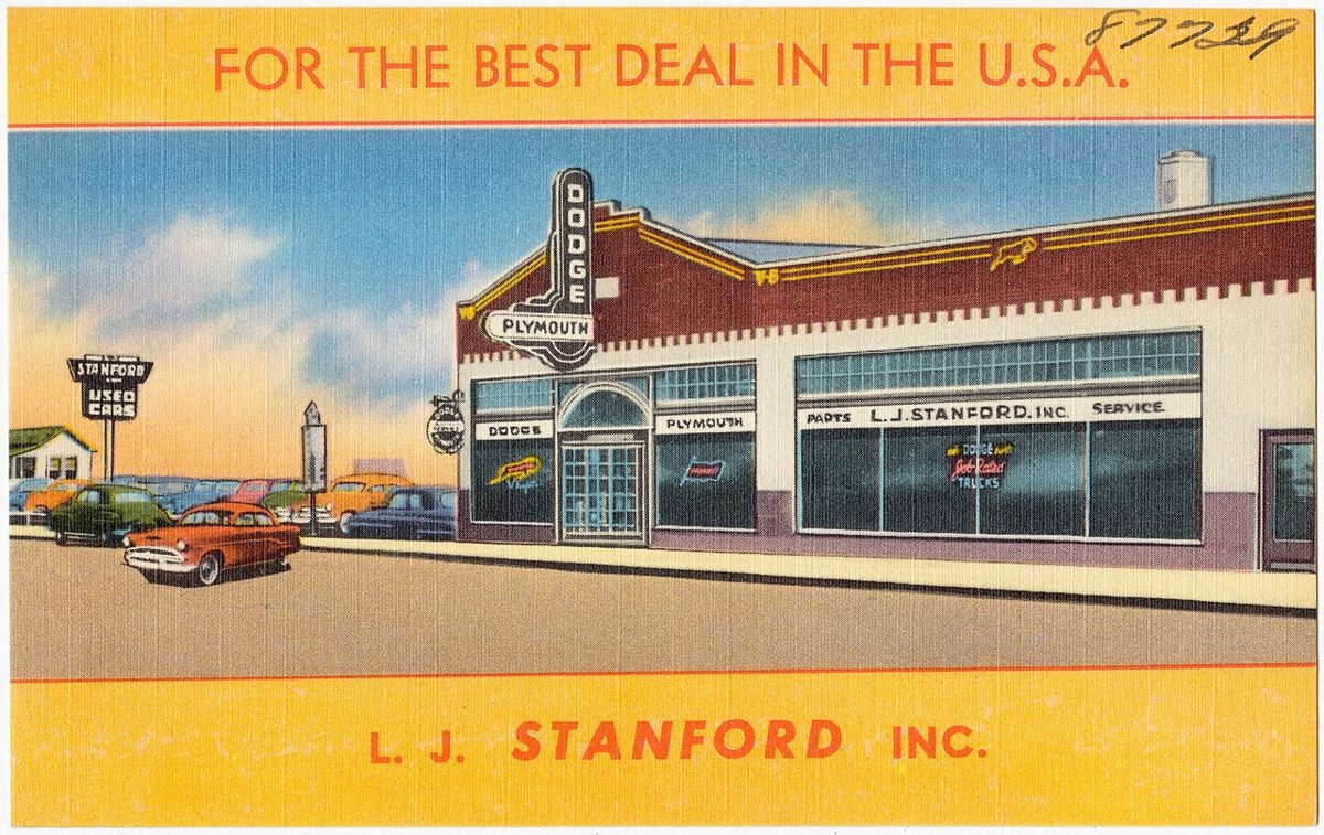 Postcard of L. J. Stanford auto dealer on Michigan Ave in Dearborn